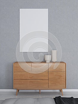 Mockup of vertical frame on a grey wall and sideboard with table decorations