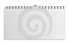 Mockup wall calendar. Blank horizontal white sheets hanging on wall. Front view empty square pages on spiral, office