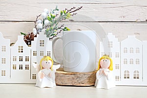 Mockup of a white ceramic mug on a light background