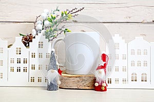 Mockup of a white ceramic mug on a light background