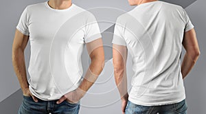 Mockup white t-shirt on muscular man on gray background.