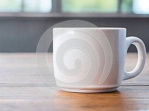 Mockup of a white, text-free, blank mug with blurred windows background.