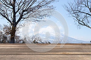 Mockup wood table for product display with Fuji mountain background