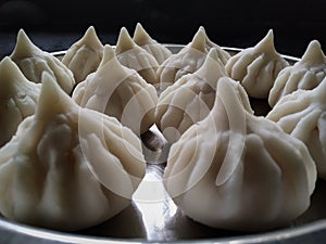 Modak, Maharashtrian traditional food, serve in steel plate