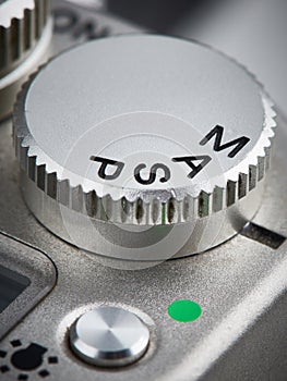 Mode control dial on SLR camera