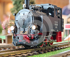 Model 99 steam locomotive on the rail