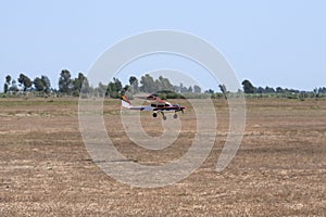 A model airplane stunt plane spinning. Model: tri 60