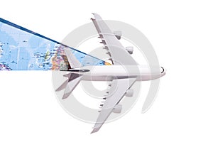 Model airplane on white paper background opens a world map