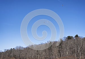 Model airplanes being flown in the sky photo