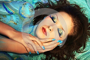 Model in Aqua bodypainting