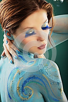 Model in Aqua bodypainting photo