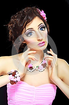 Model with barbie doll make-up