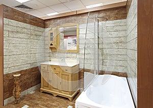 Model bathroom with tiles in a showroom