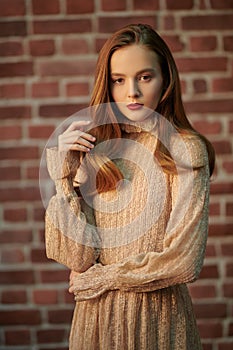 Model in beige dress