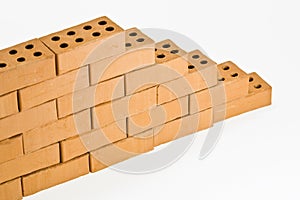 Model brick wall - building construction and construction industry concept
