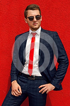 Model businessman in a blue suit and tie