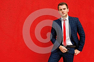 Model businessman in a blue suit and tie