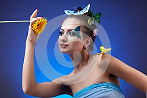 Model with butterfly bodyart