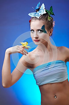 Model with butterfly bodyart