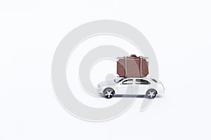 Model car with luggage toy isolate on white background