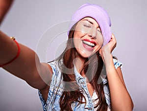 Model in casual summer clothes with no makeup in studio