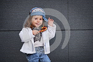 Model child hip-hop.baby in a baseball cap.