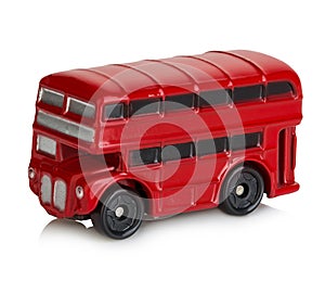 Model of classic red London bus close-up isolated on a white background.