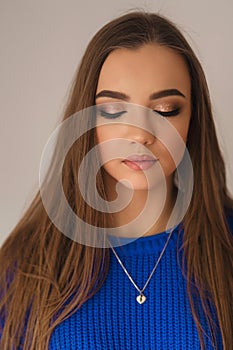 Model closed her eyes to show her makeup