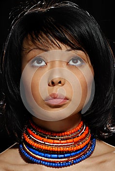 Model with colorful rings on neck