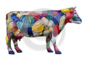 Model of a cow is ornamented by vegetables and fruit