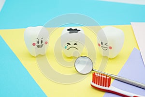 Model Cute toys teeth in dentistry on colorful pastel paper for background