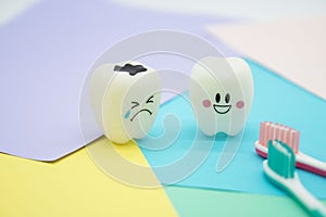 Model Cute toys teeth in dentistry on colorful pastel paper for background