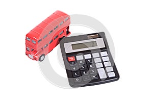 Model of a double-decker red bus and calculator