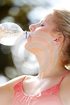 Model drinking a water