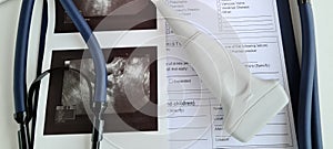 Model of embryo and ultrasound of uterus