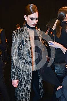 A model getting ready backstage at the Nicole Miller fashion show during MBFW Fall 2015