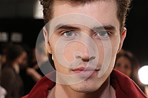 A model getting ready backstage at the SERGIO DAVILA fashion show during Mercedes-Benz Fashion Week Fall 2015