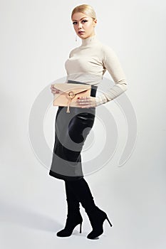 Model holding purse