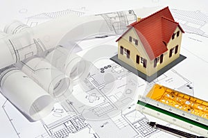 Model house on a construction plan