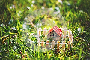 Model of house with fence