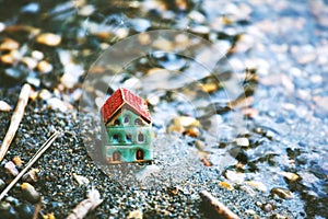 Model of house near water