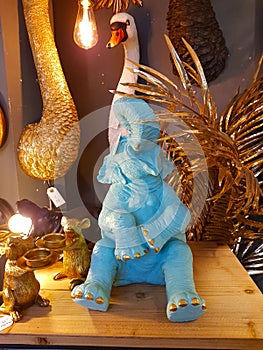A model of a large blue laughing elephant.