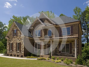 Model Luxury Home Exterior side view porch