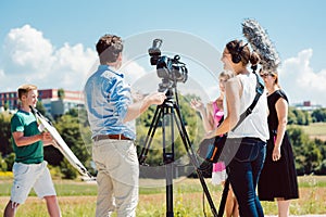 Model in the make-up during video shoot on production set