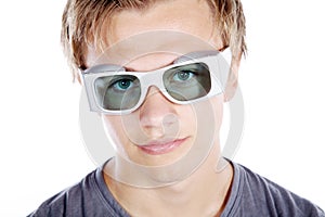 Model man looks with safety goggles