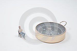 the model miniature on compass with white background