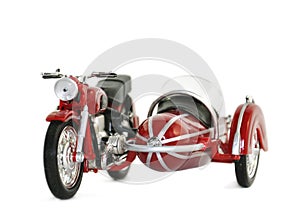 Model of motorcycle with a sidecar. Isolated photo