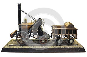 Model of old-fashioned steam engine train isolated on white background