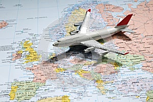 Model of a passenger aircraft on Europe Map