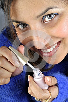 Model with pink nail paint